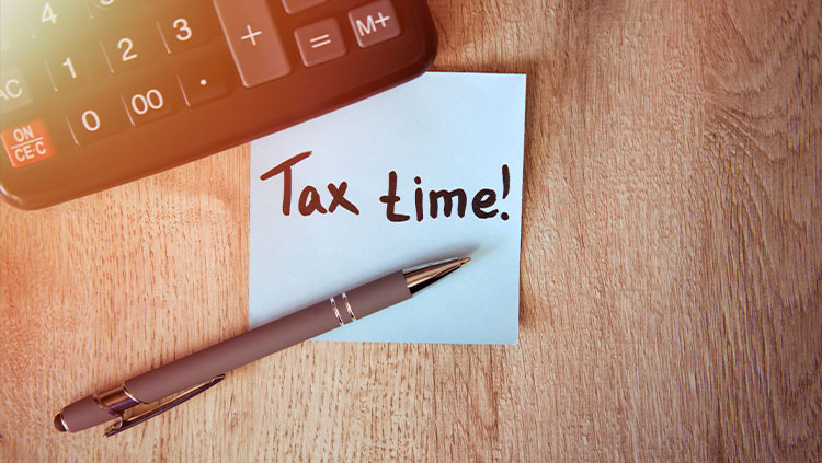 Tax time calculator on desk